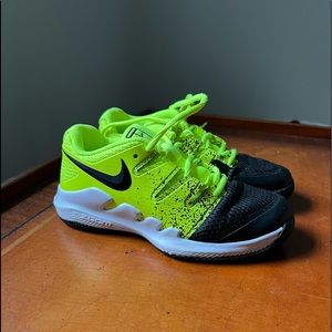 Boys Nike tennis sneaker.